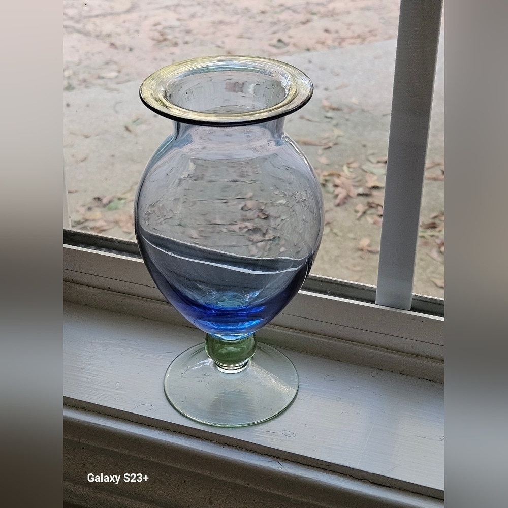 Elegant blue and green glass footed vase.